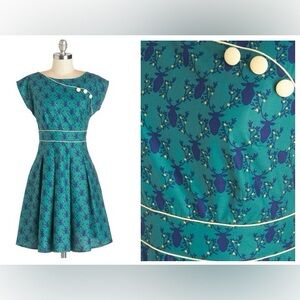 Retrolicious Teal Swing Dress with Yellow Buttons